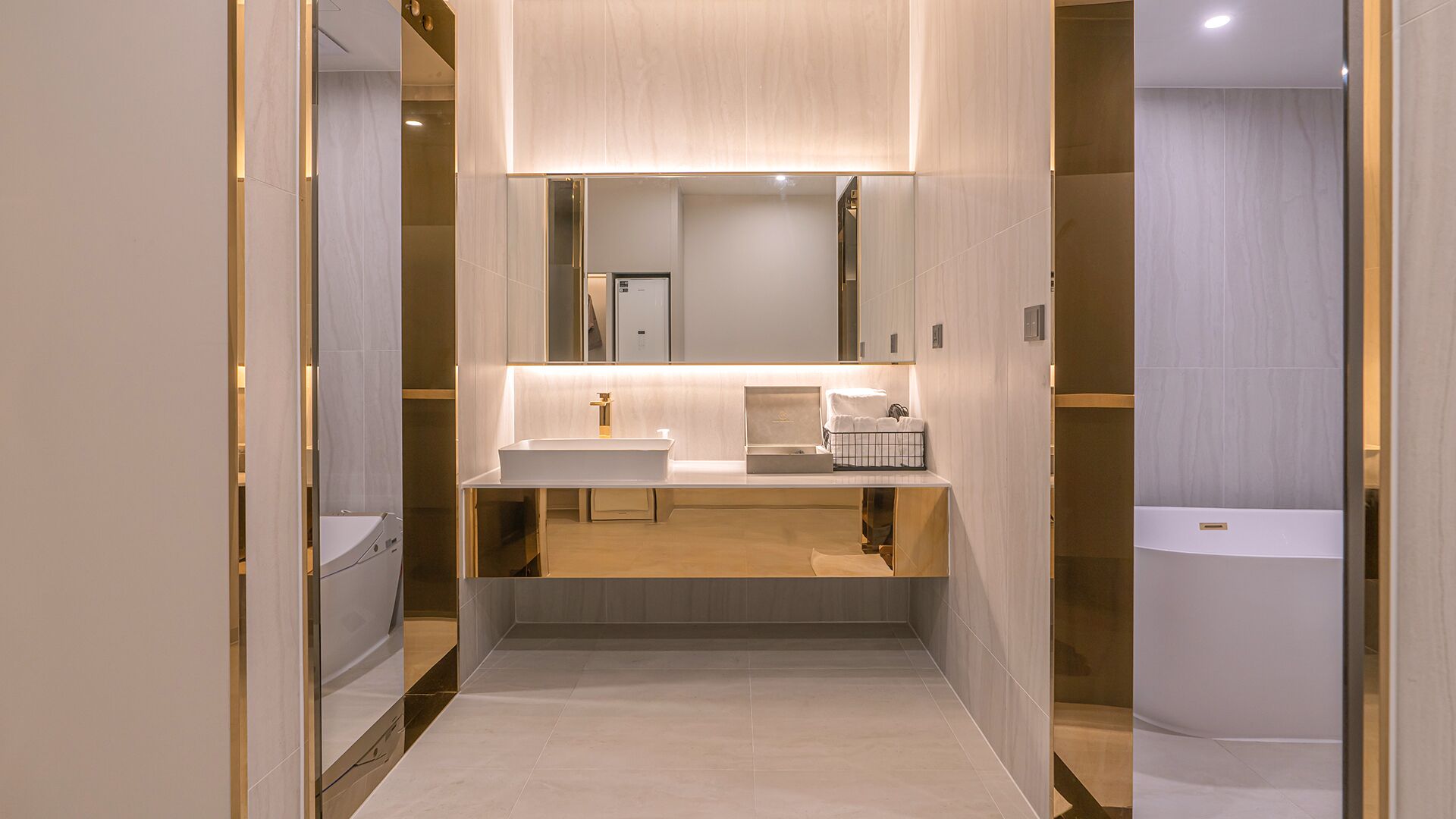 A modern bathroom with a vanity, mirror, and two sinks.