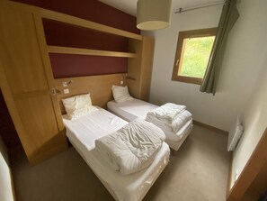 2 habitaciones, wifi gratis y ropa de cama