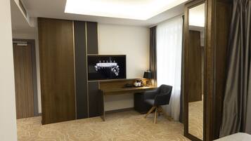 Deluxe Double Room, 1 King Bed, Non Smoking, City View | Living area | 50-inch Smart TV with digital channels, TV, printers