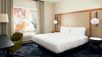 Desk, laptop workspace, iron/ironing board, free cribs/infant beds