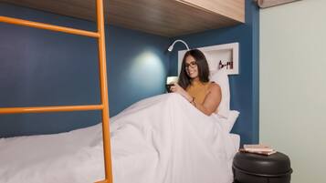 Apartamento, várias camas | Escrivaninha, cortinas blackout, quartos à prova de som, berços grátis