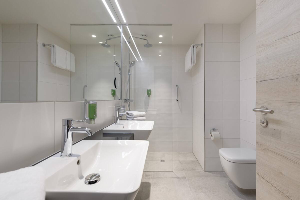 family room, multiple beds (modern) | hypo-allergenic bedding, desk, blackout curtains, soundproofing