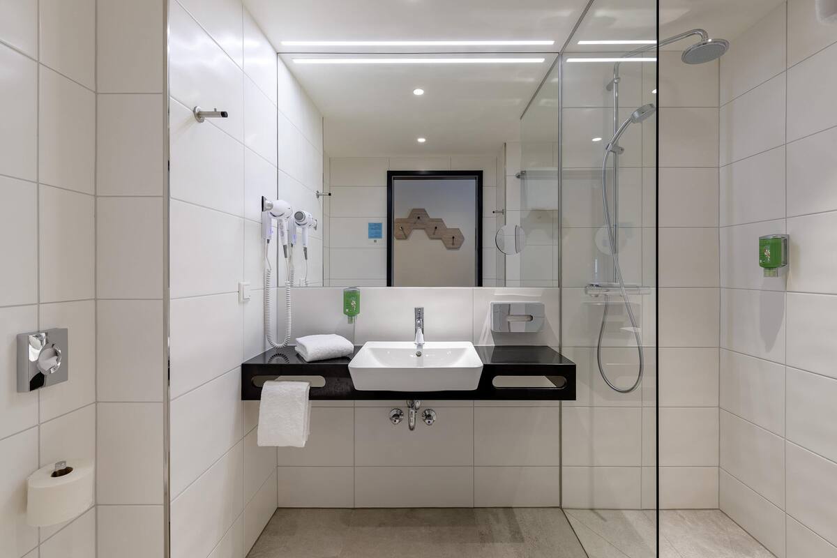 hypo-allergenic bedding, desk, blackout curtains, soundproofing