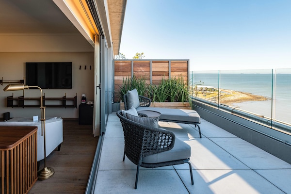 Deluxe Suite, 1 King Bed, Balcony, Sea View | Minibar, in-room safe, desk, blackout drapes