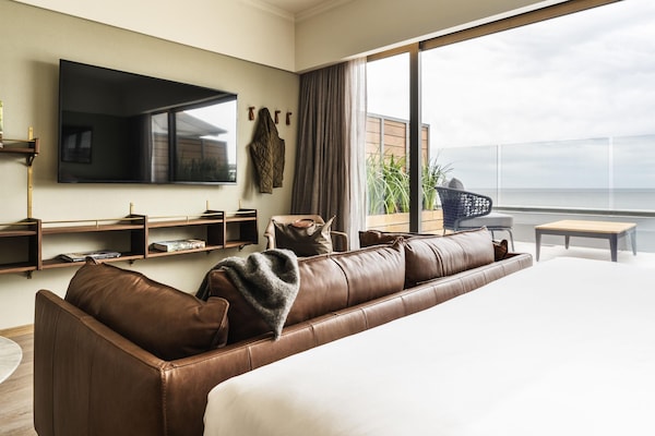 Deluxe Suite, 1 King Bed, Balcony, Sea View | Minibar, in-room safe, desk, blackout drapes