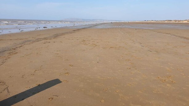 A wide sandy beach with footprints and a clear sky. - 8 Berth Caravan with Spacious enclosed garden (Brean)