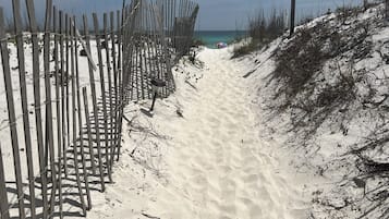 On the beach, sun-loungers, beach towels