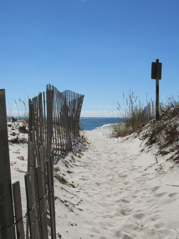 On the beach, sun-loungers, beach towels - Amazing! Ground Floor Unit in Tiki Beach. Truly, Just Steps to the Gulf. (Fort Walton Beach)