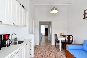 Appartement | Coin séjour | Télévision à écran plat de 32 pouces avec chaînes par câble, télévision