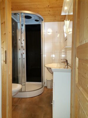 Shower, hair dryer, towels, soap