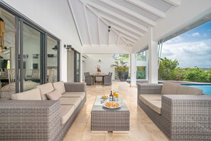 Outdoor dining - Villa Ocean House, large pool and sea view (Le François)