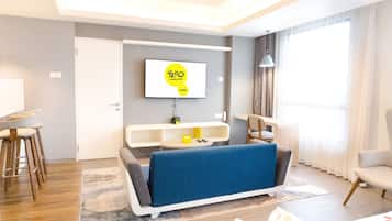 Suite (YELLO) | Living area | 43-inch LED TV with digital channels, TV