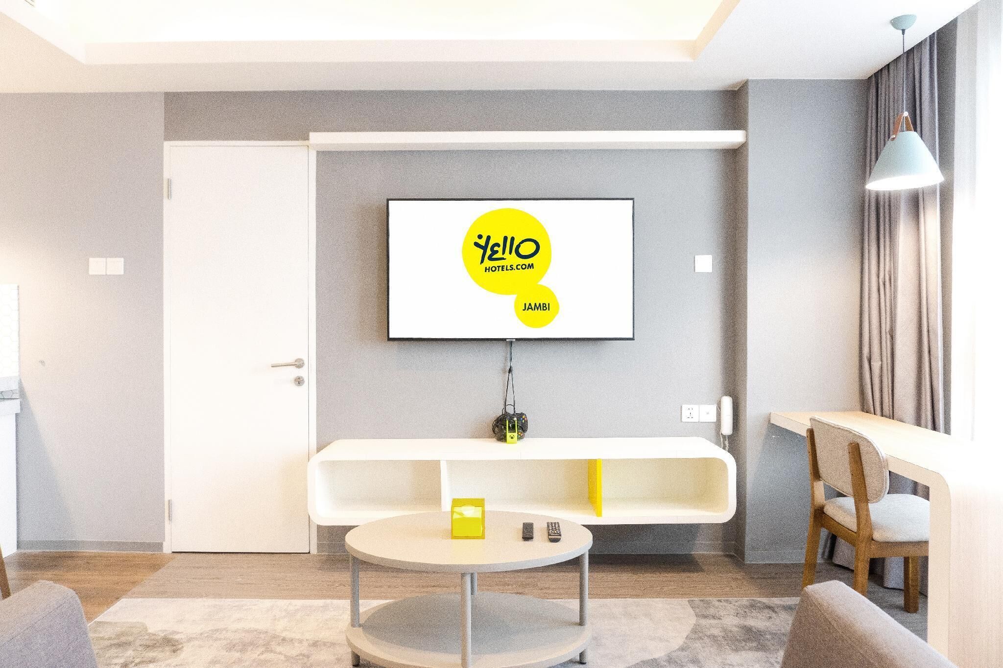 Suite (YELLO) | Minibar, in-room safe, desk, laptop workspace