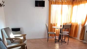 Standard Cabin | Living area | Flat-screen TV