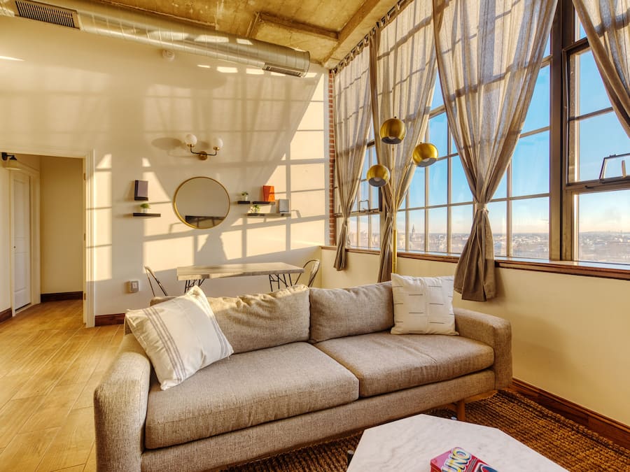 Penthouse, 1 Bedroom | Living area | 45-inch TV with digital channels