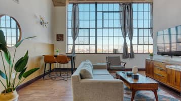 Apartment, 2 Bedrooms, Balcony | Living area | 45-inch TV with digital channels