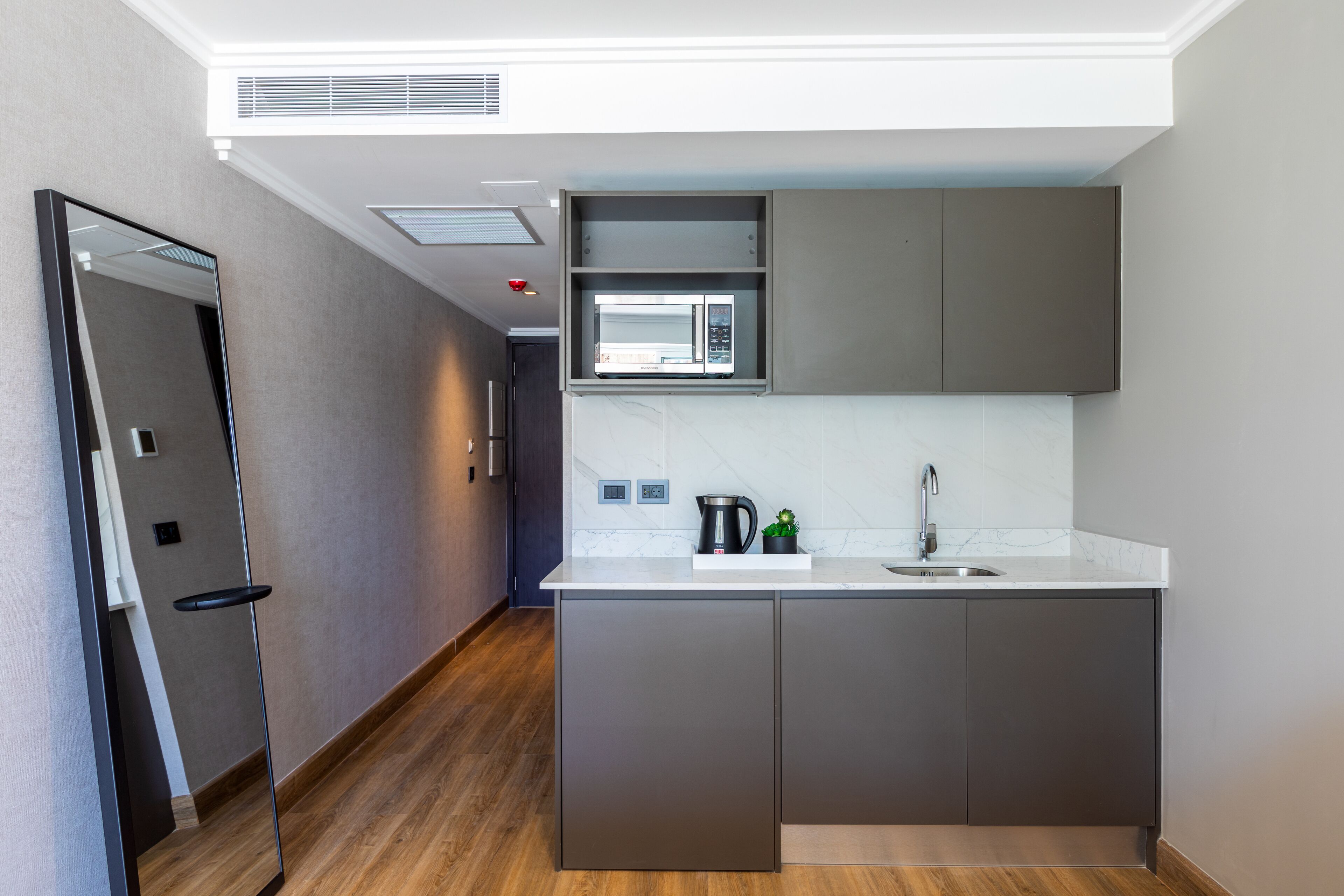 mini-fridge, microwave, coffee/tea maker, electric kettle