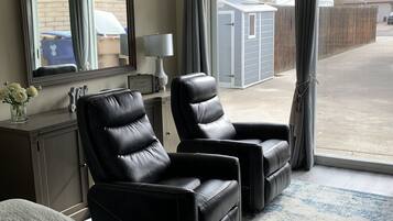 1 bedroom, desk, iron/ironing board, travel crib