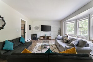 Smart TV, fireplace, foosball, books