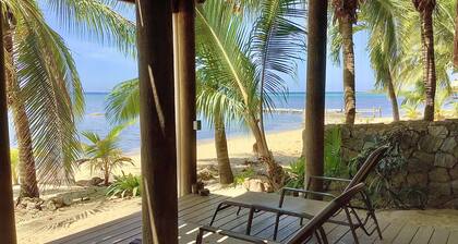 Beachfront home with pristine, calm waters, white sands and unbelievable sunset