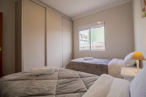 2 bedrooms, blackout curtains, iron/ironing board, free WiFi