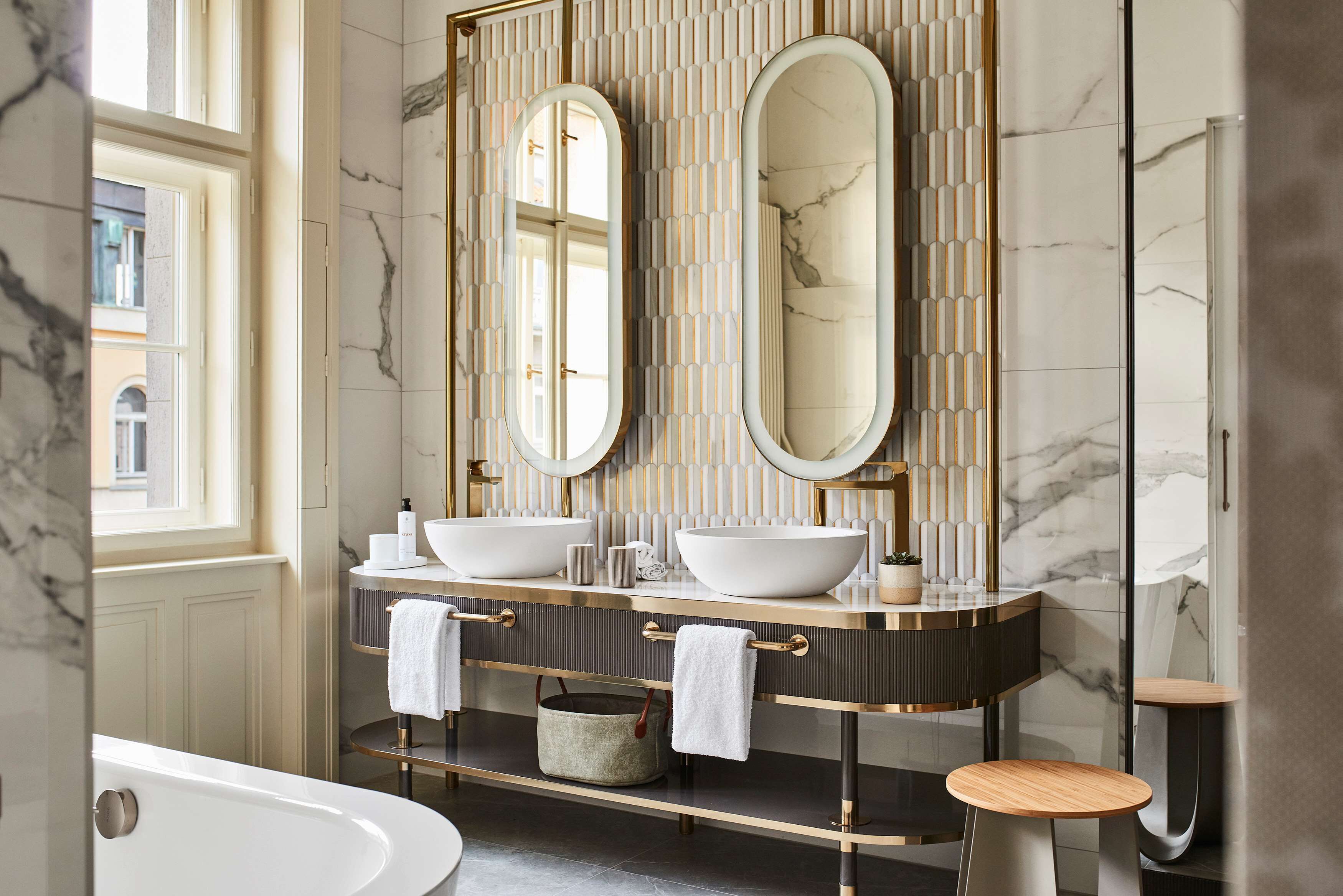 designer toiletries, hair dryer, bathrobes, slippers