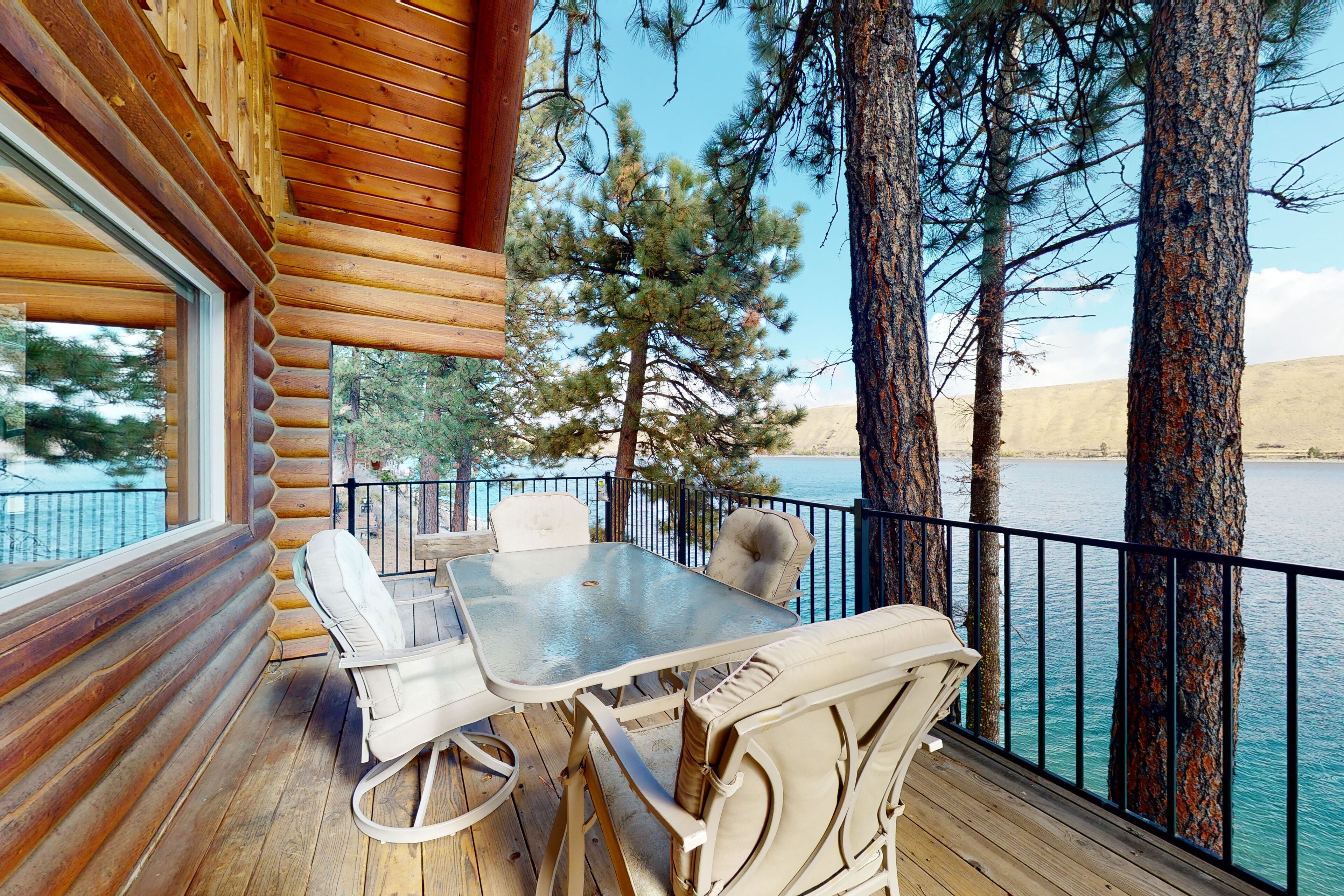 Large & attractive house right on the lake with private hot tub, wood stove