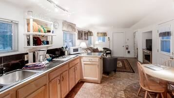 Fridge, microwave, stovetop, coffee/tea maker