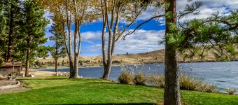 Waterfront dog-friendly home with lake view, private dock, deck, fireplace