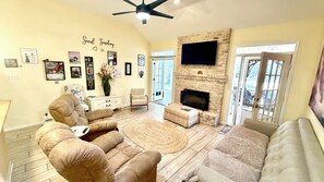 Smart TV, fireplace, books, offices