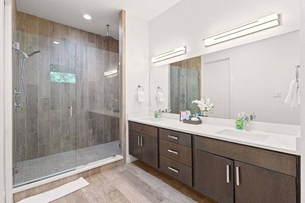 Combined shower/tub, hair dryer, towels, soap