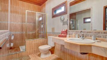 Bathtub, hair dryer, towels