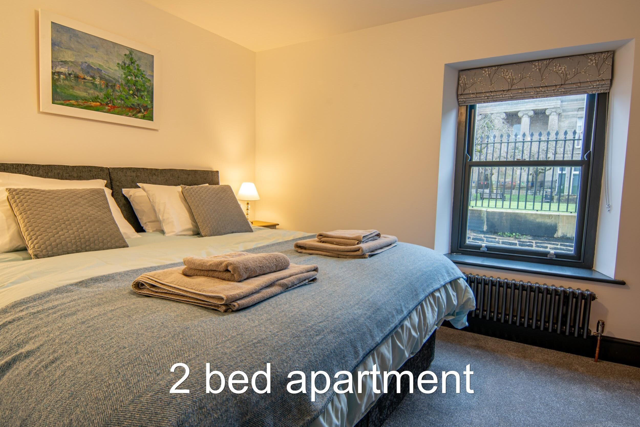 2 bedrooms, soundproofing, iron/ironing board, travel cot