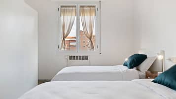 2 dormitorios, tabla de planchar con plancha, wifi y ropa de cama