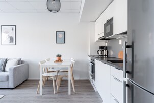 City Apartment | Private kitchen | Full-size fridge, microwave, oven, stovetop