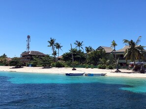 On the beach, white sand - Little Mermaid Dive Resort by Cocotel (Daanbantayan)