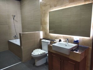 Combined shower/tub, hair dryer, towels, soap