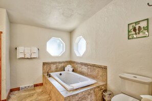 Shower, jetted tub, hair dryer, towels
