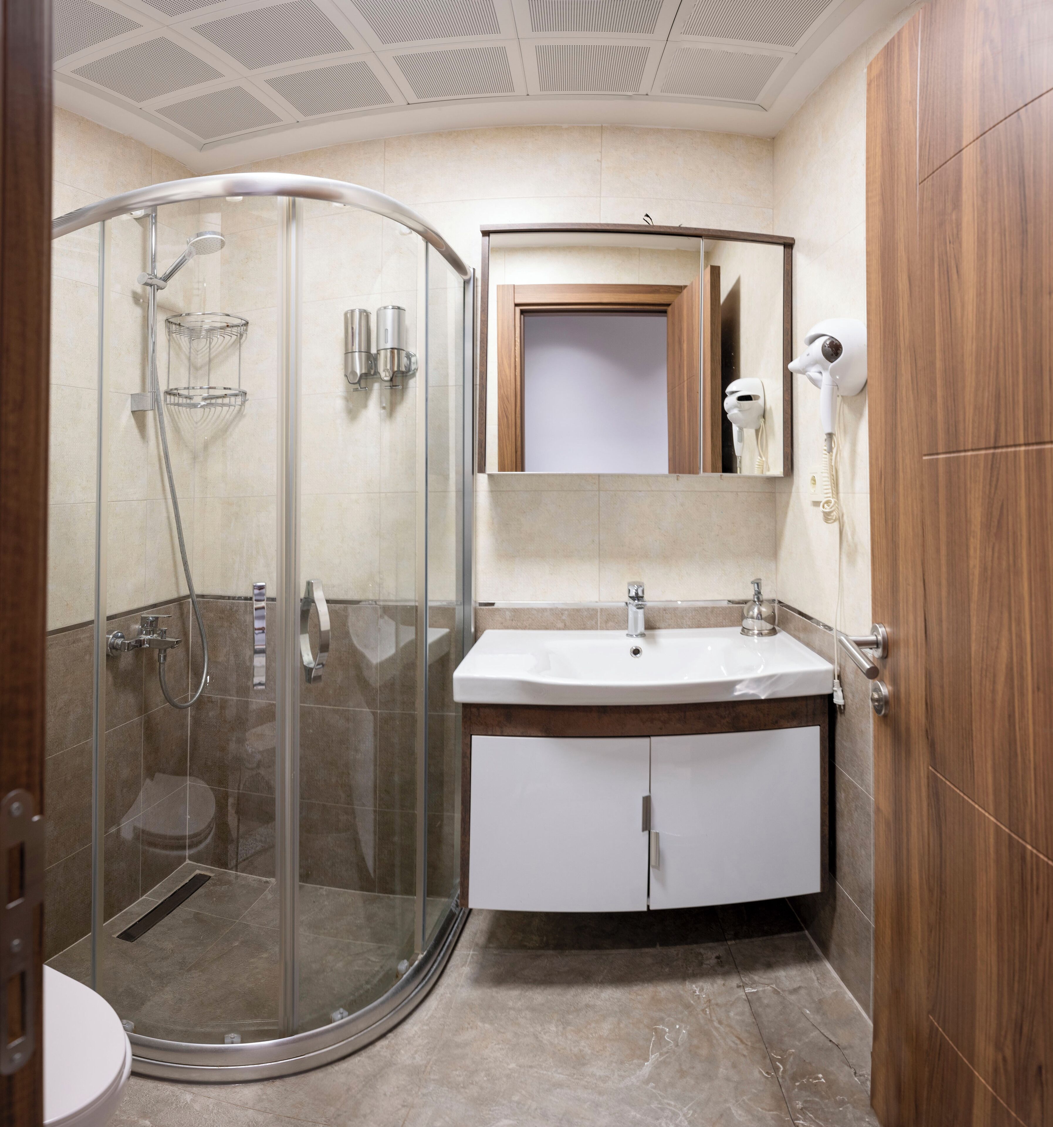Shower, free toiletries, hair dryer, slippers