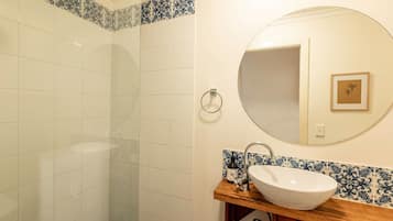 Shower, eco-friendly toiletries, hair dryer, towels