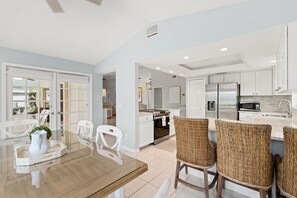 Fridge, microwave, oven, stovetop - Luxury Waterfront Retreat: Heated Pool, Hot Tub, Direct Gulf Access & Game Room! (Cape Coral)