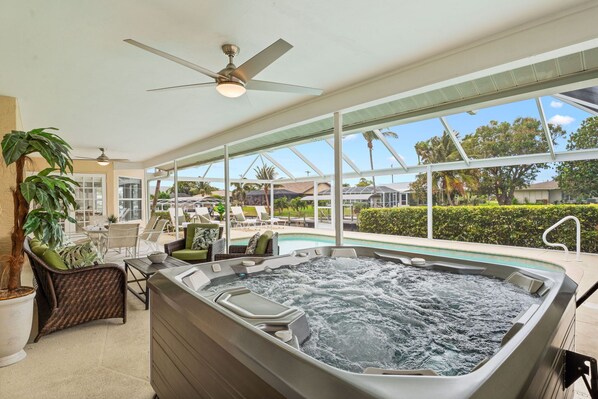 Terrace/patio - Luxury Waterfront Retreat: Heated Pool, Hot Tub, Direct Gulf Access & Game Room! (Cape Coral)