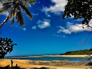 On the beach, sun loungers, beach towels