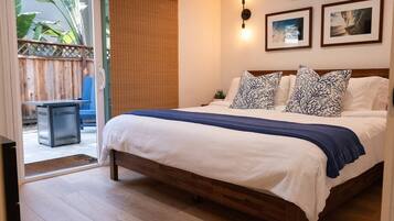 2 dormitorios, tabla de planchar con plancha, cuna de viaje