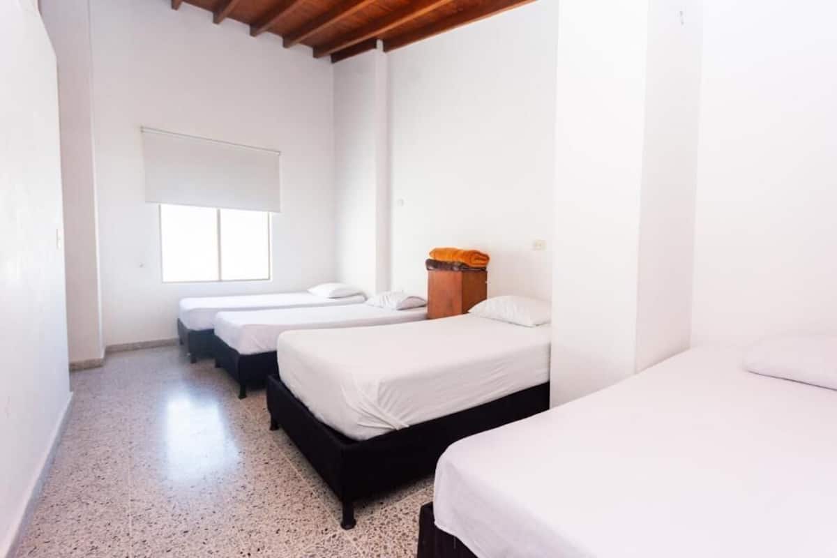 Family Room | Egyptian cotton sheets, premium bedding, desk, laptop workspace