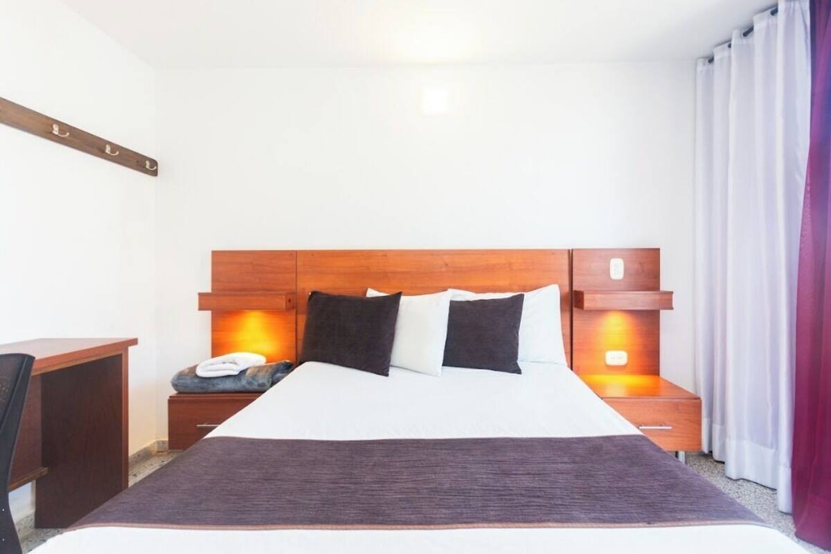 Egyptian cotton sheets, premium bedding, desk, laptop workspace