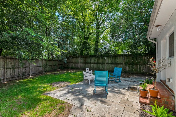 Chat with loved ones in the comfort of our fenced yard.