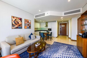 55-inch flat-screen TV with satellite channels, TV