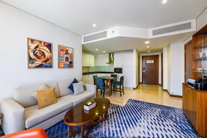 55-inch flat-screen TV with satellite channels, TV