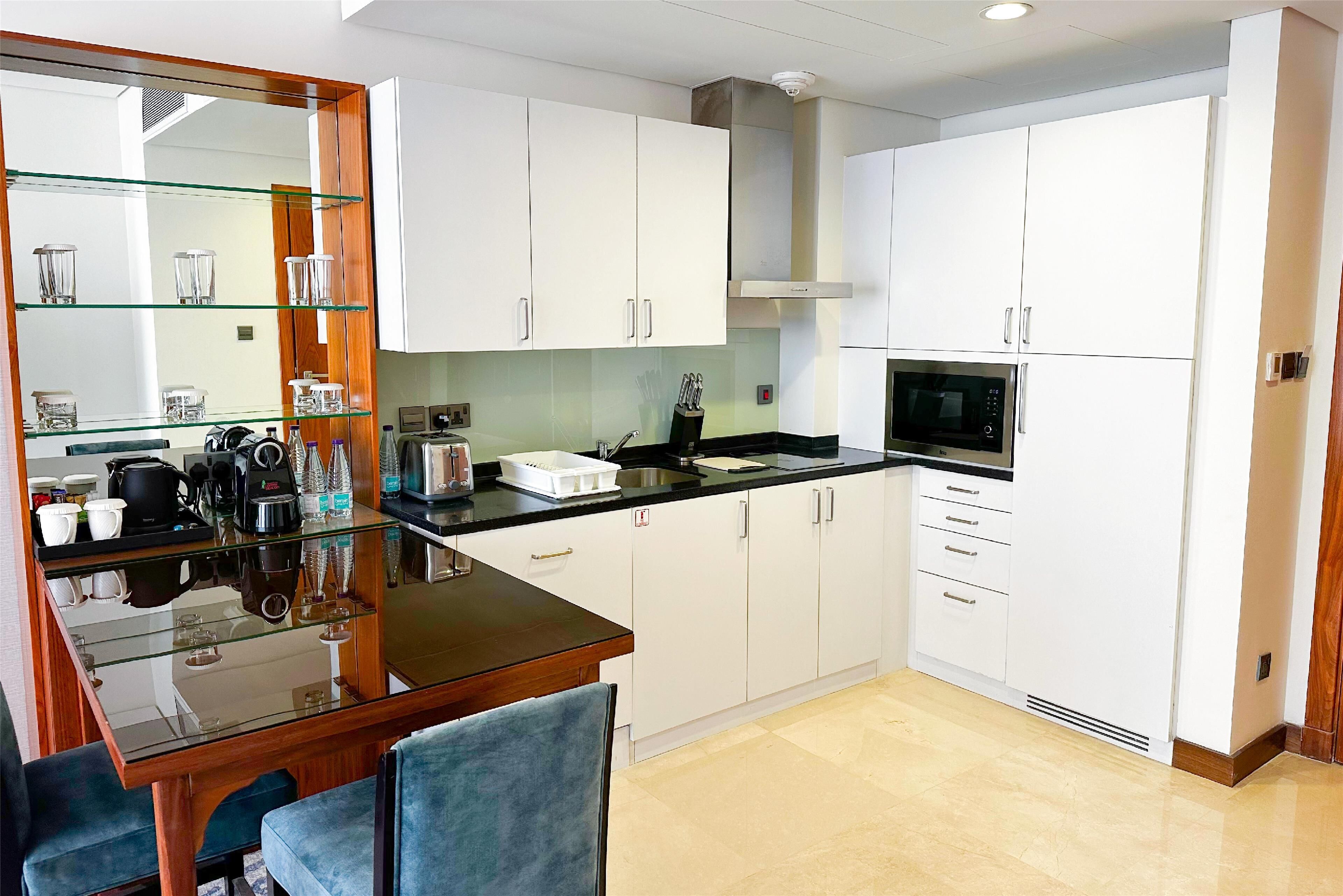 full-sized fridge, microwave, dishwasher, espresso maker